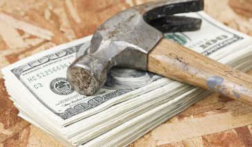 Hammer on Stack of Money